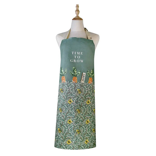 Green apron with 'Time to Grow' text and plant illustrations on a mannequin against a white background