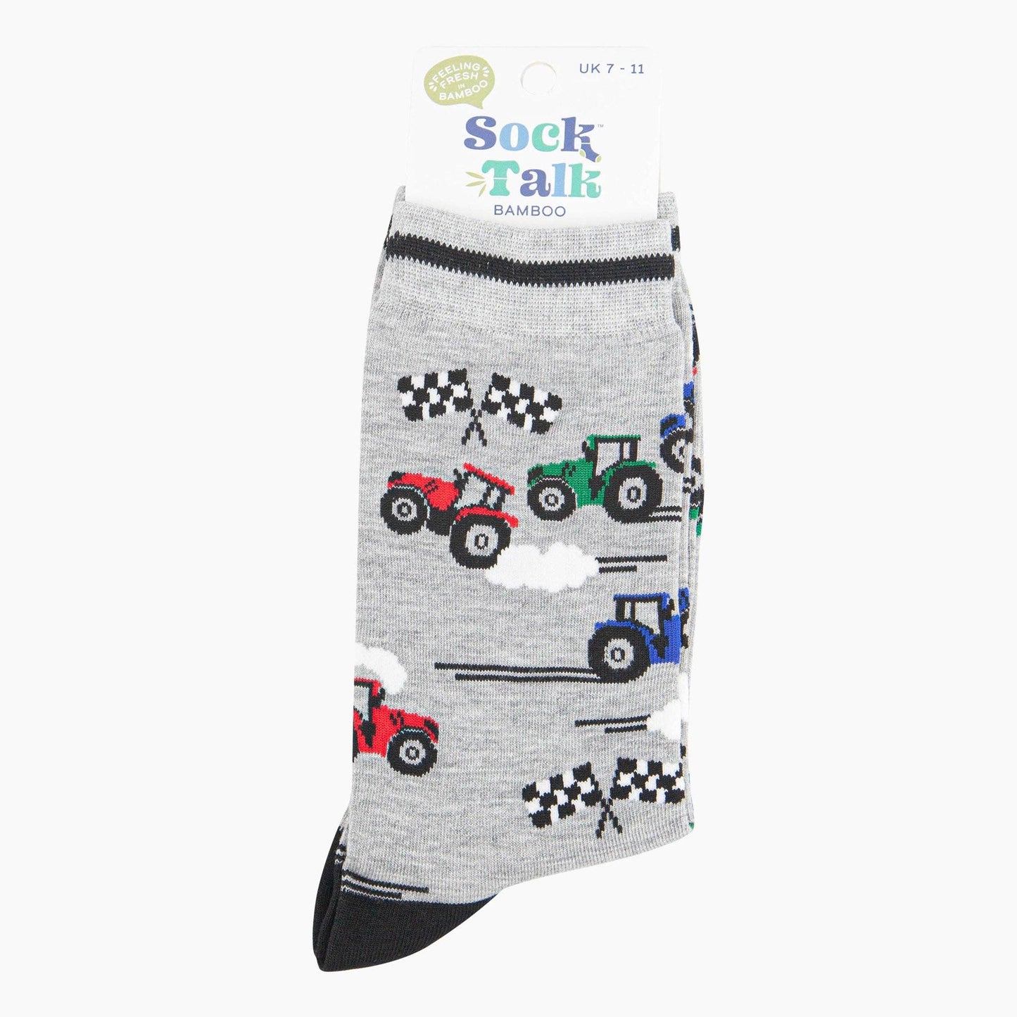 Gray sock with tractor and racing car pattern on a white background