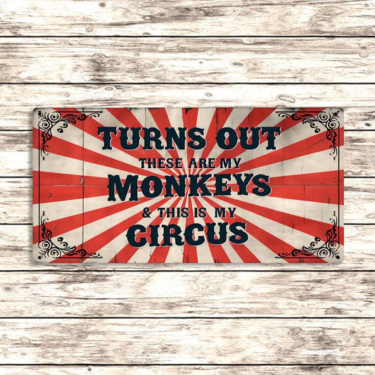 Decorative sign with text 'Turns out these are my monkeys & this is my circus' on a wooden background