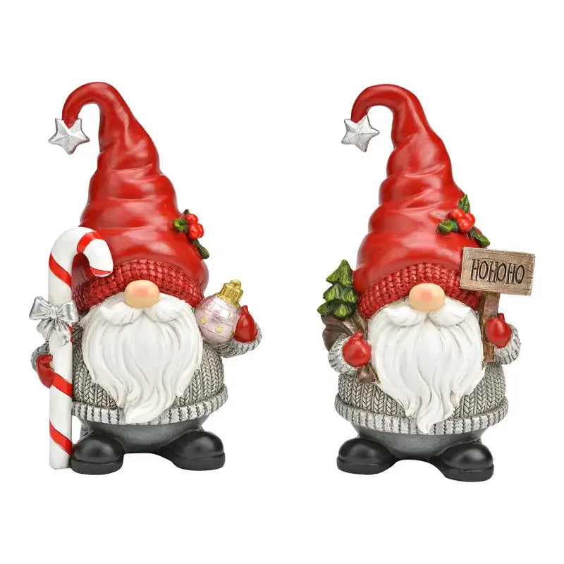 Two Christmas-themed gnomes with red hats and white beards on a white background.