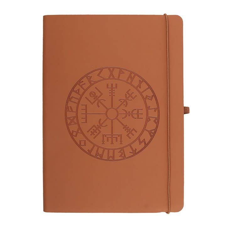 Brown leather notebook with embossed design on a white background