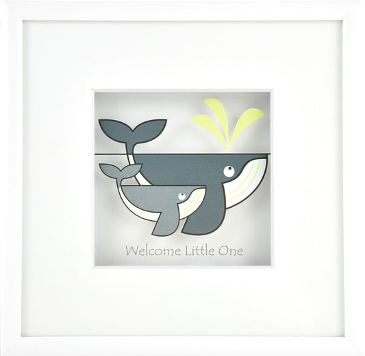 Framed artwork with a whale design and 'Welcome Little One' text on a white background