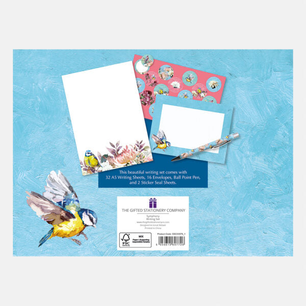 Writing set with stationery items on a blue background, featuring The Gifted Stationery Company branding.