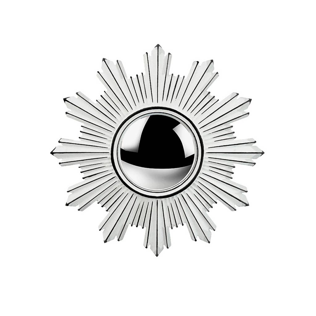 Decorative sunburst mirror on a white background