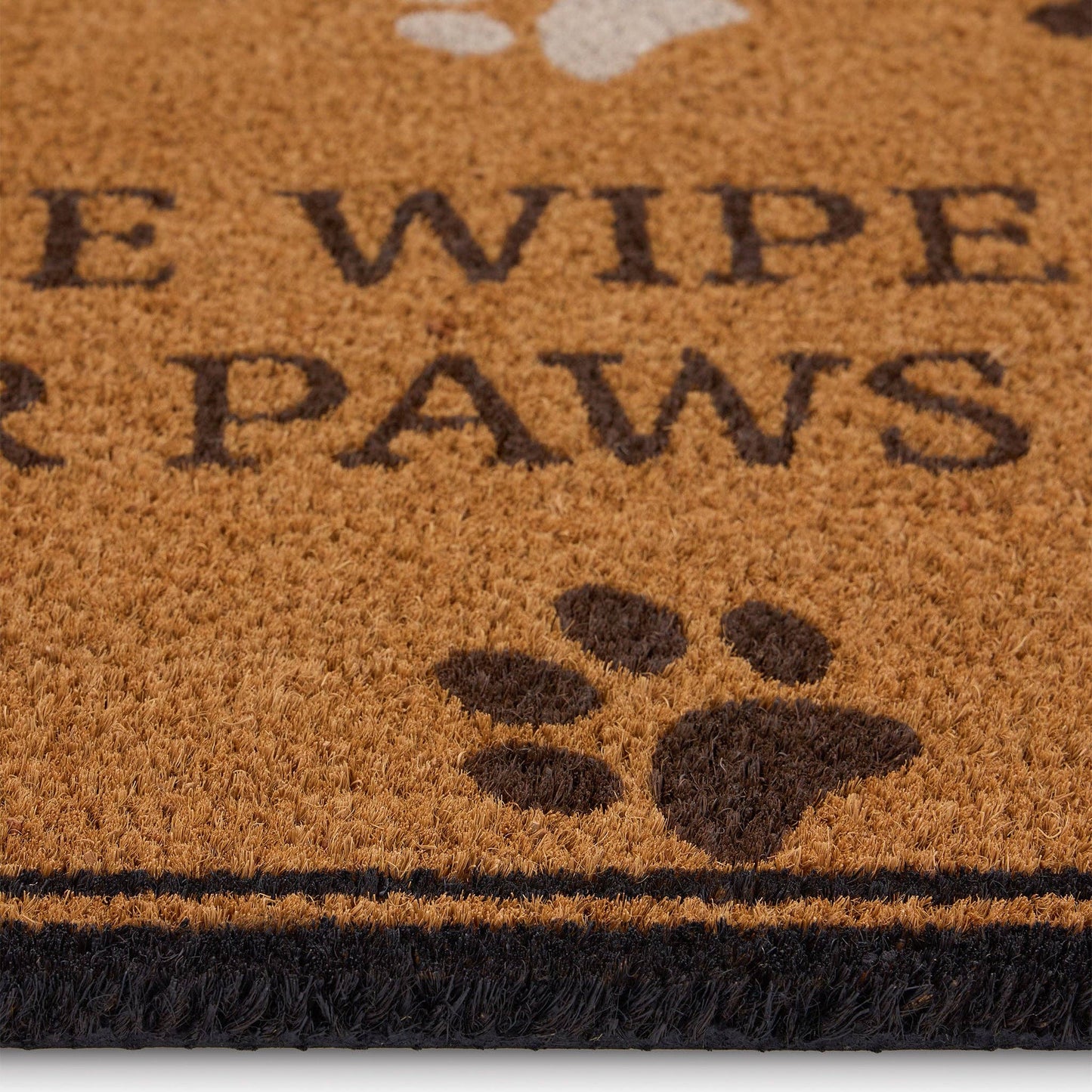 Doormat with 'Please wipe your paws' text and paw prints on a brown background