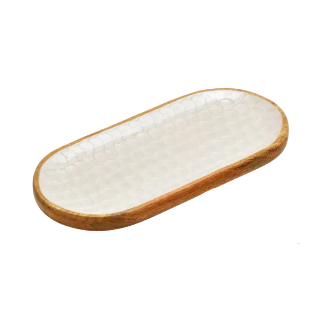 Oval ceramic dish with wooden rim on a white background