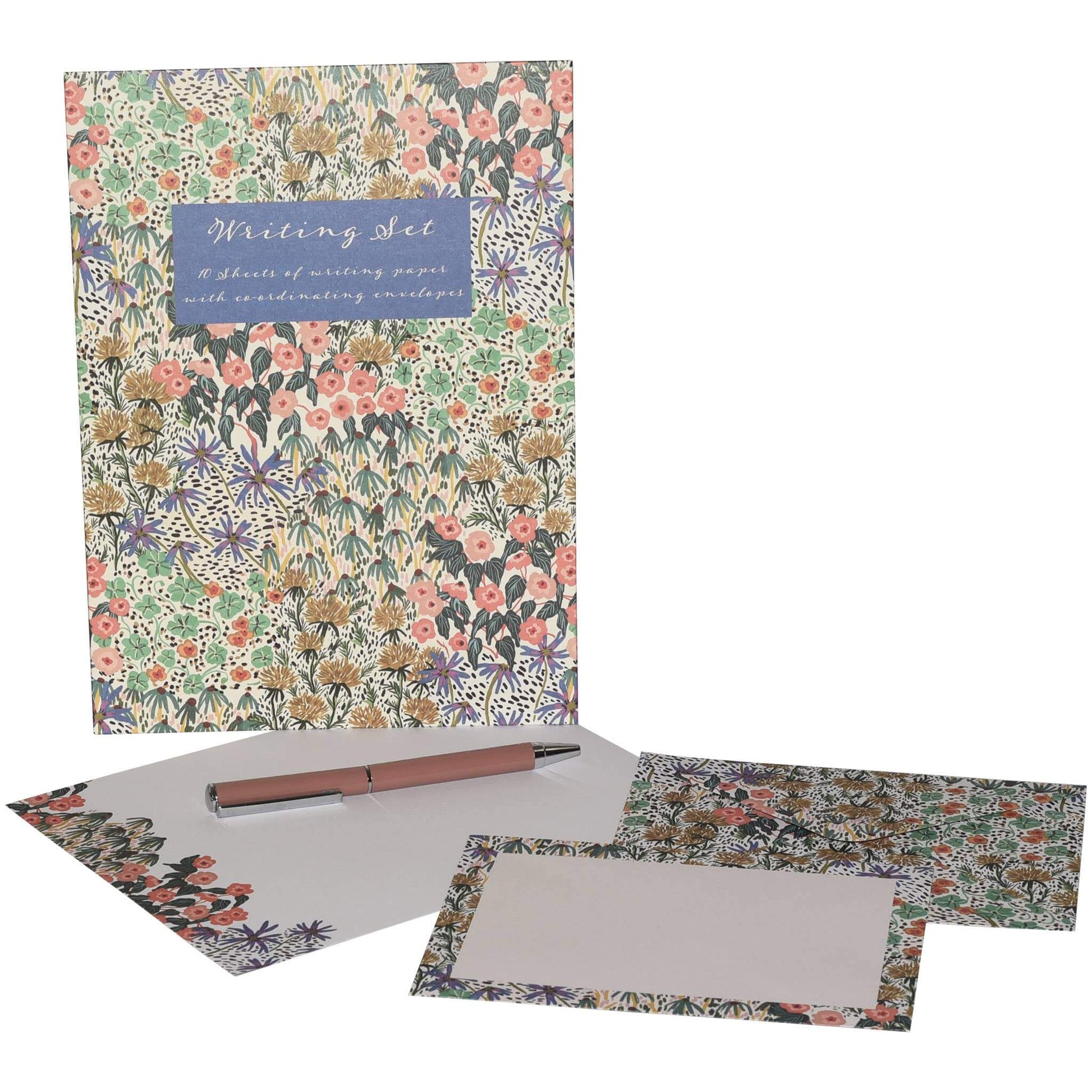 A floral writing set including a notebook, envelope, stationery cards, and a pen, all decorated with a dense multicolor botanical pattern on a white background.