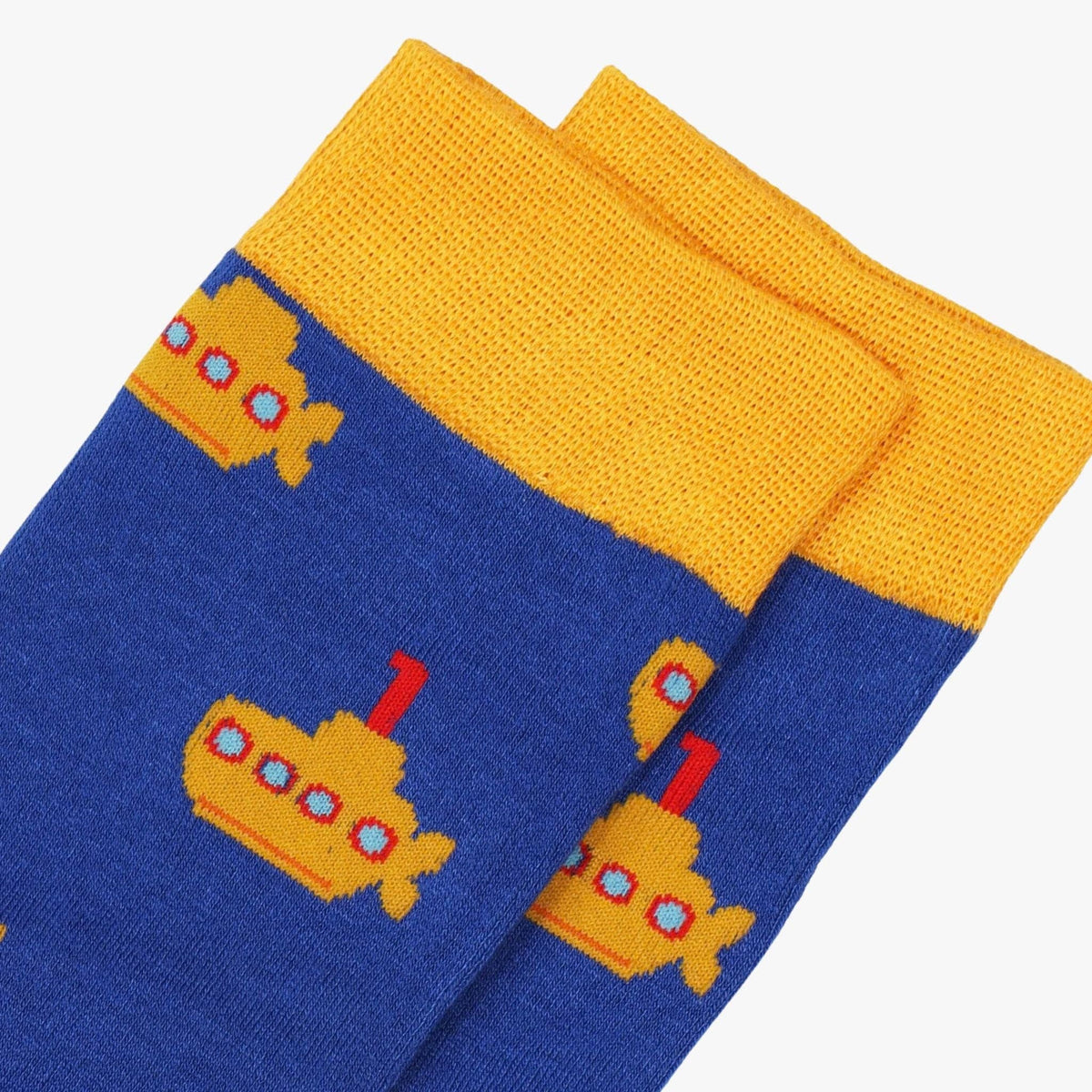 Pair of socks with yellow submarine design on a blue background