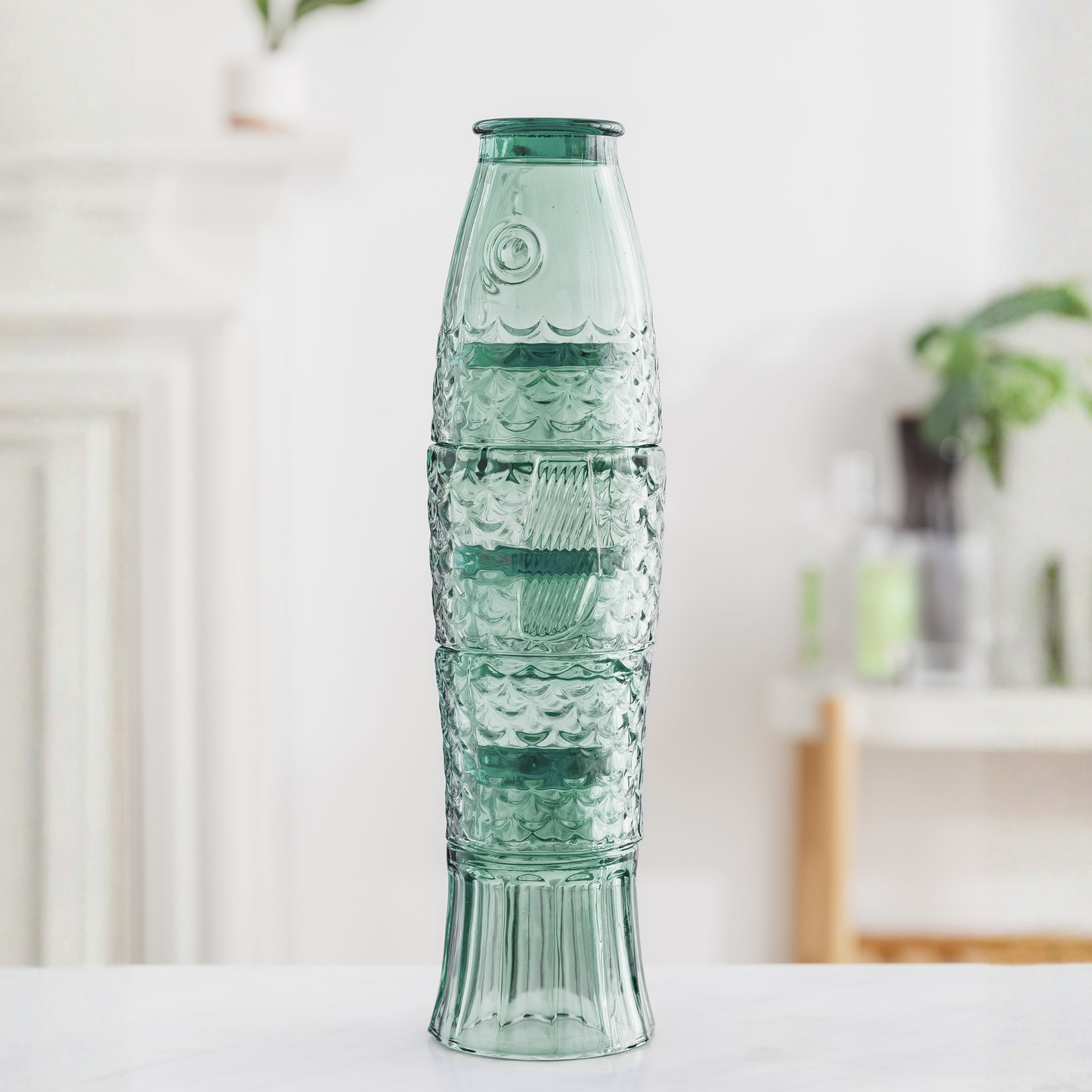 Green - Fish Stacking Drinking Glass - Set of 4 Glasses on a table
